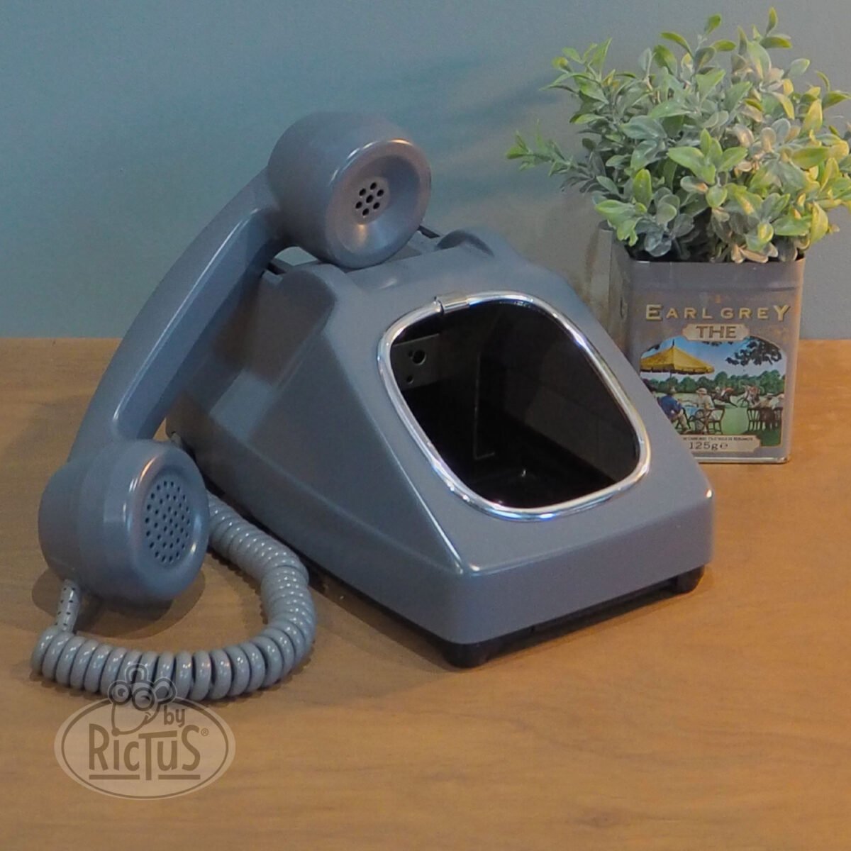 Cache-pot téléphone gris